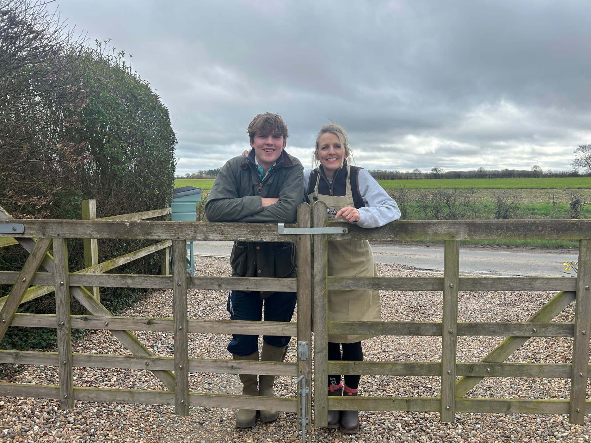 Oliver and Keri at the gate at Clintergate Farm